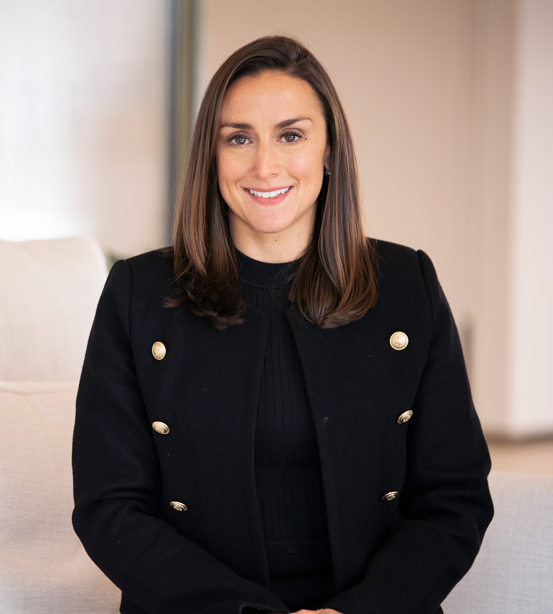 Photo of Joanna Wright standing in an office