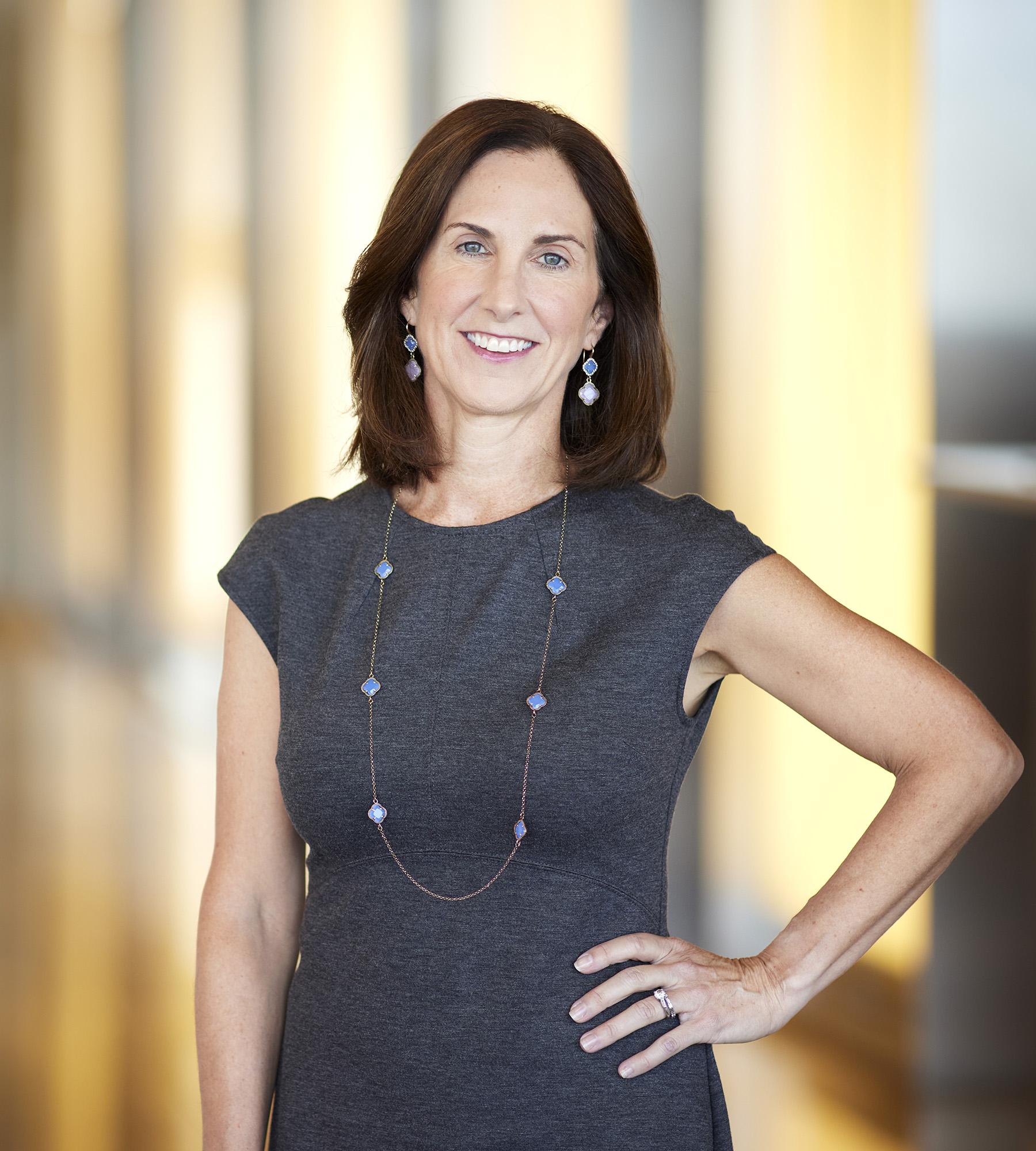Photo of Sheila Kailus standing in an office