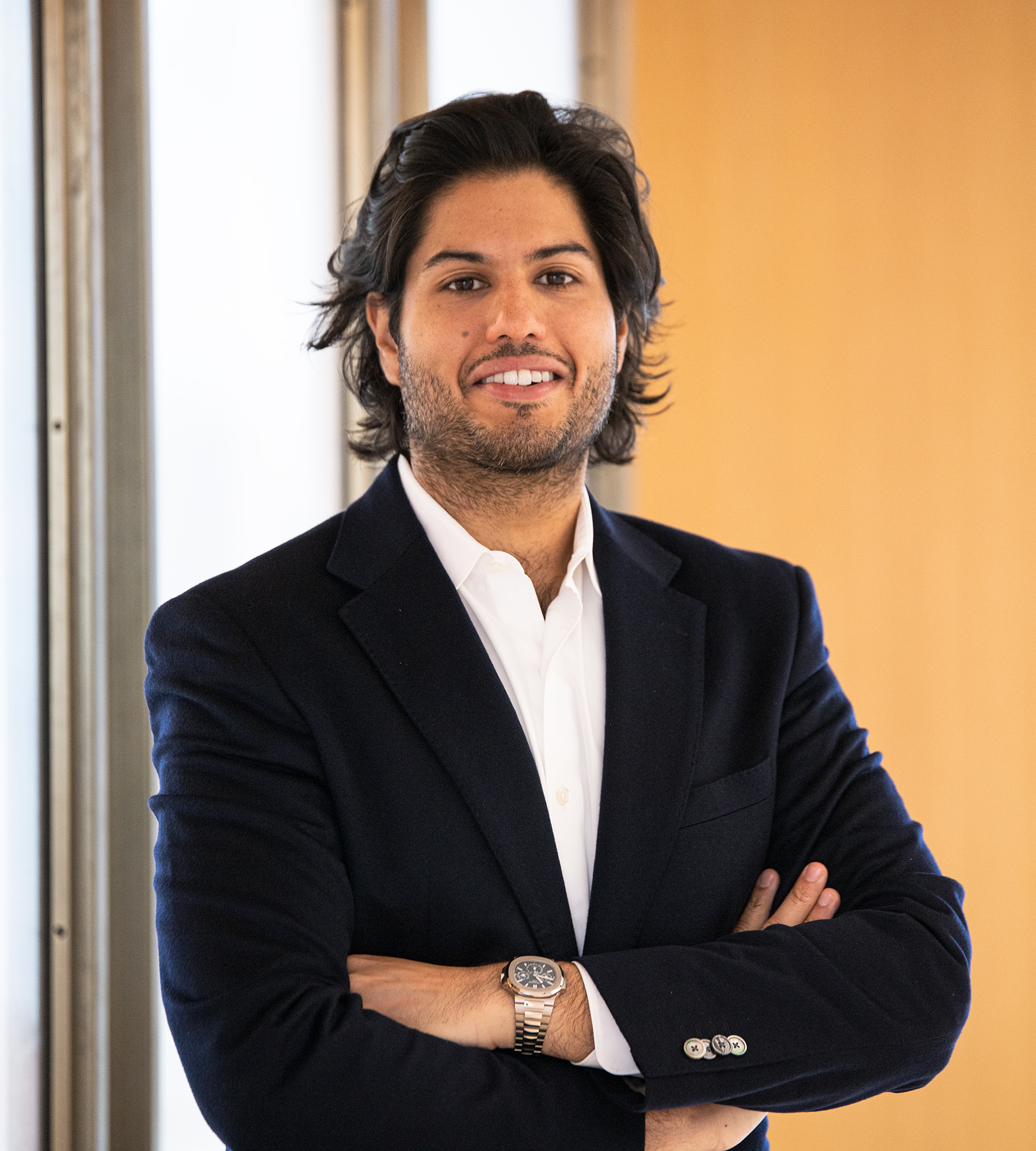 Photo of Niqui Kohli standing in an office