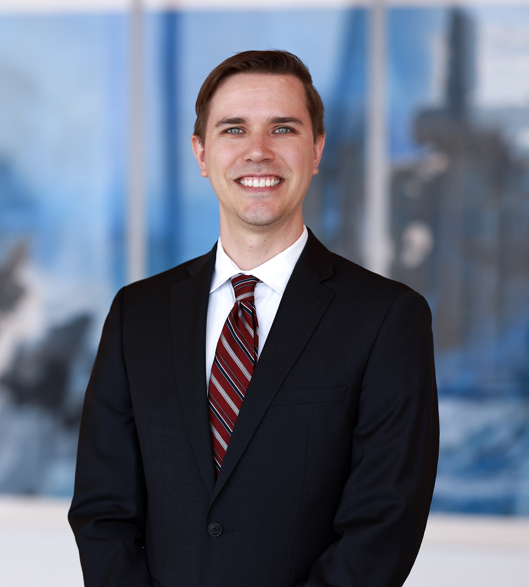 Photo of Tyler Alfermann standing in an office