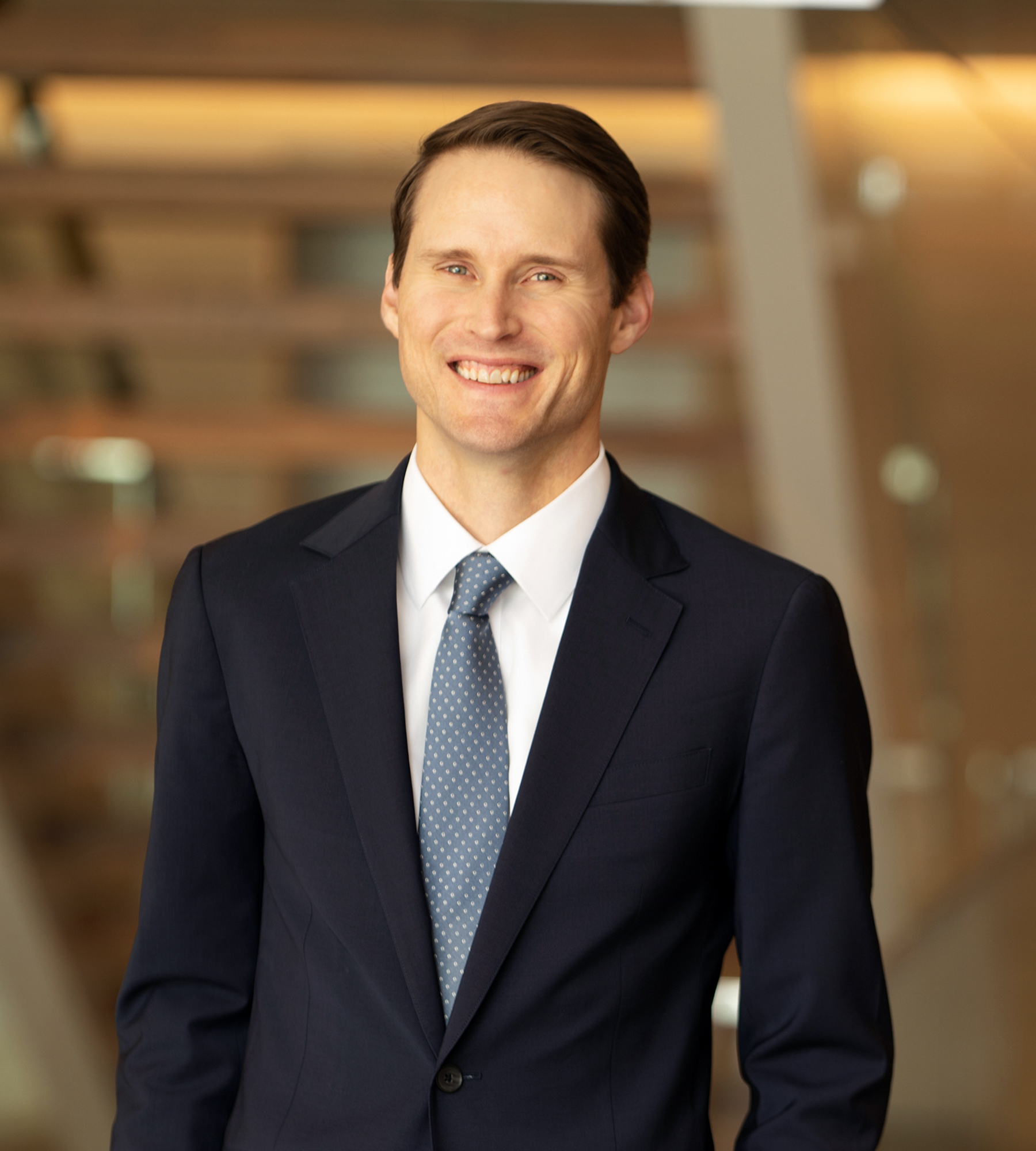 Photo of Peter Davis standing in an office