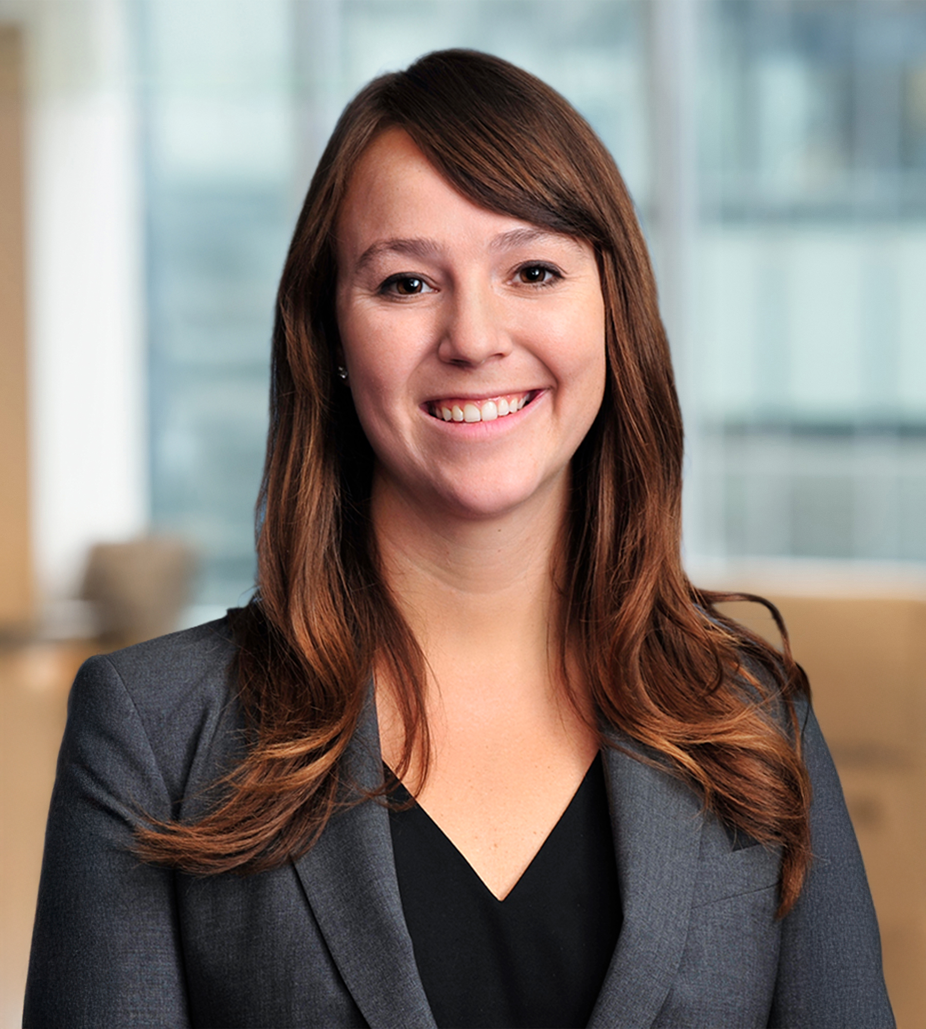 Photo of Molly Piazzi standing in an office